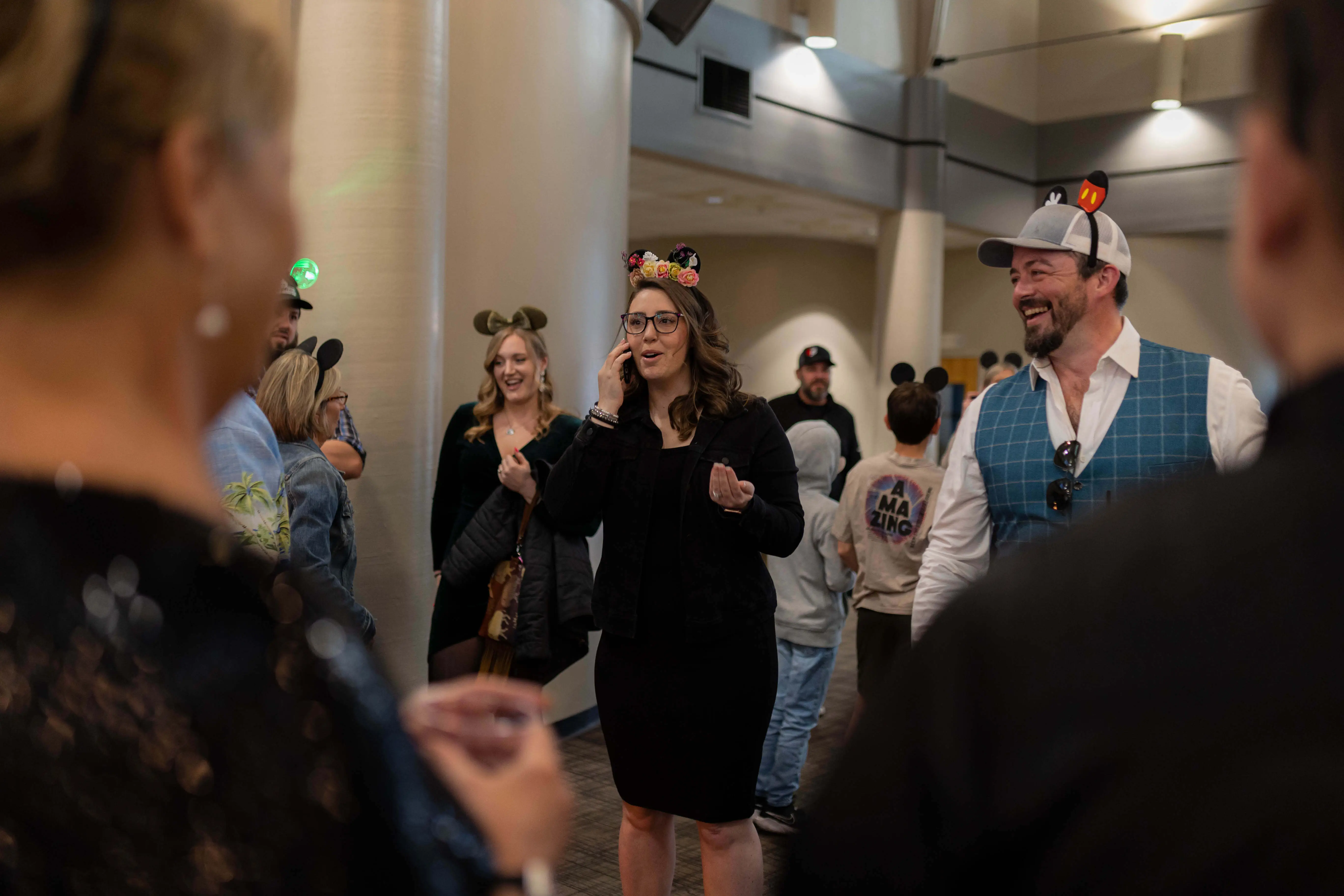 Professional live event videographer capturing audience moments