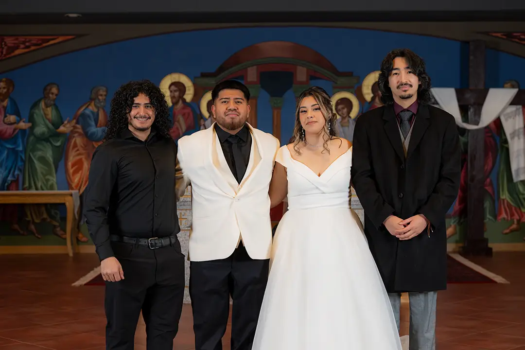 Bride posing with family in Vancouver, Washington