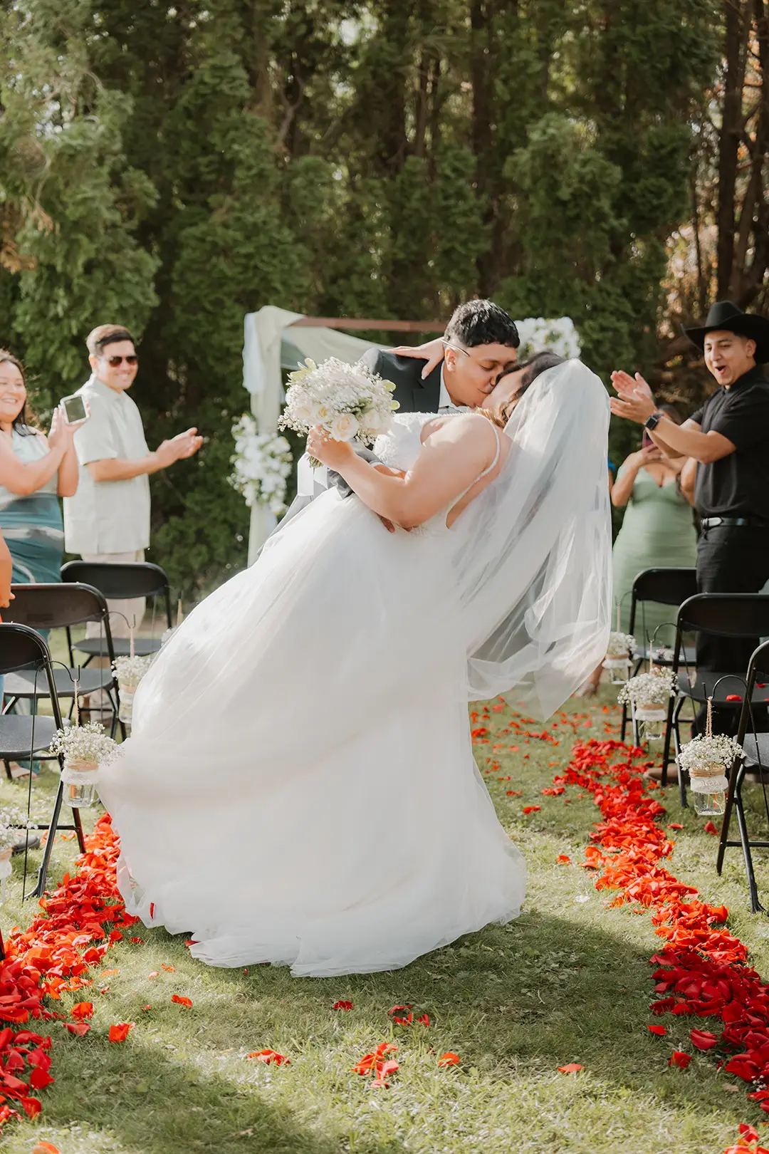 Groom dipping bride photography