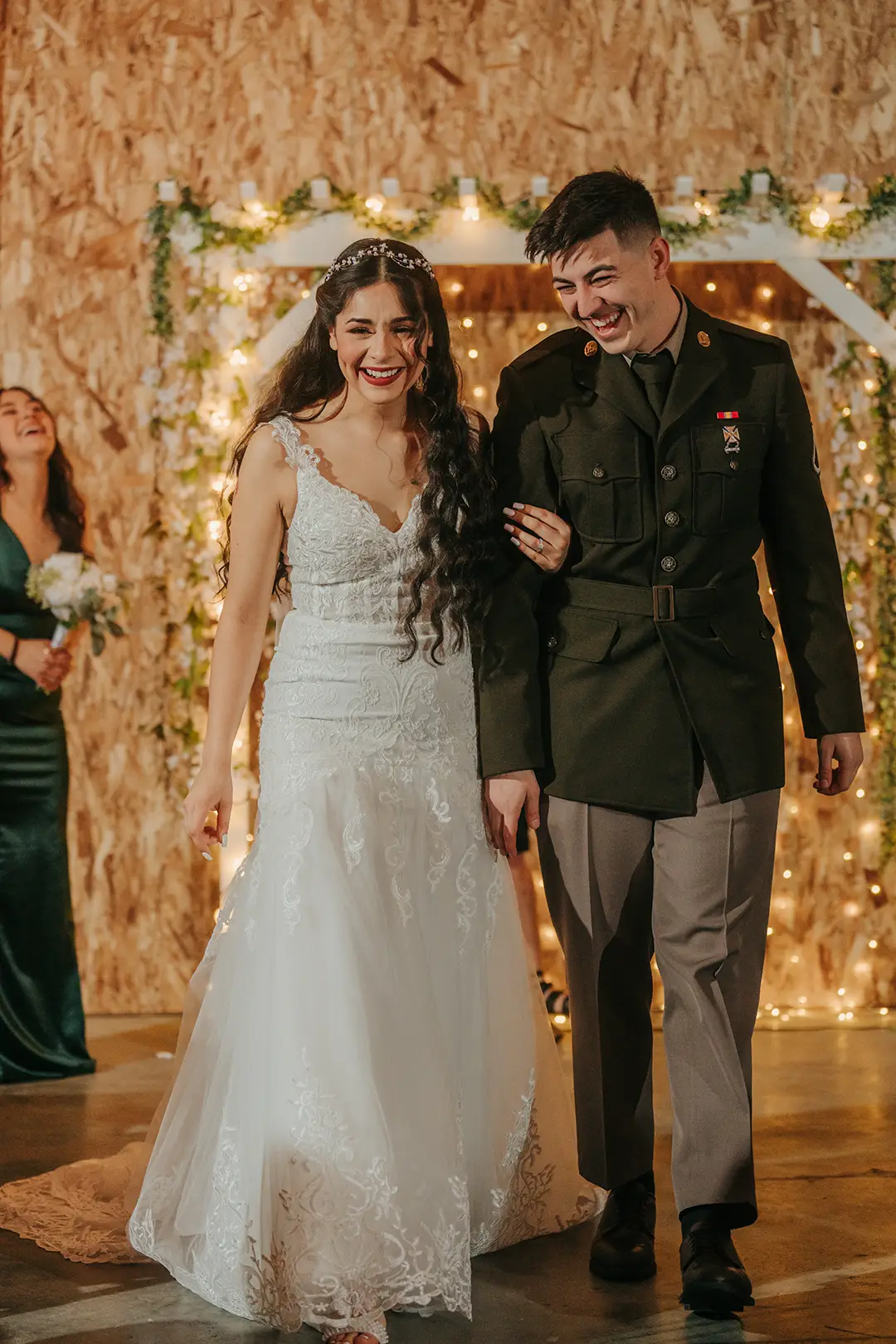 Newlyweds walking down the aisle at winter wedding
