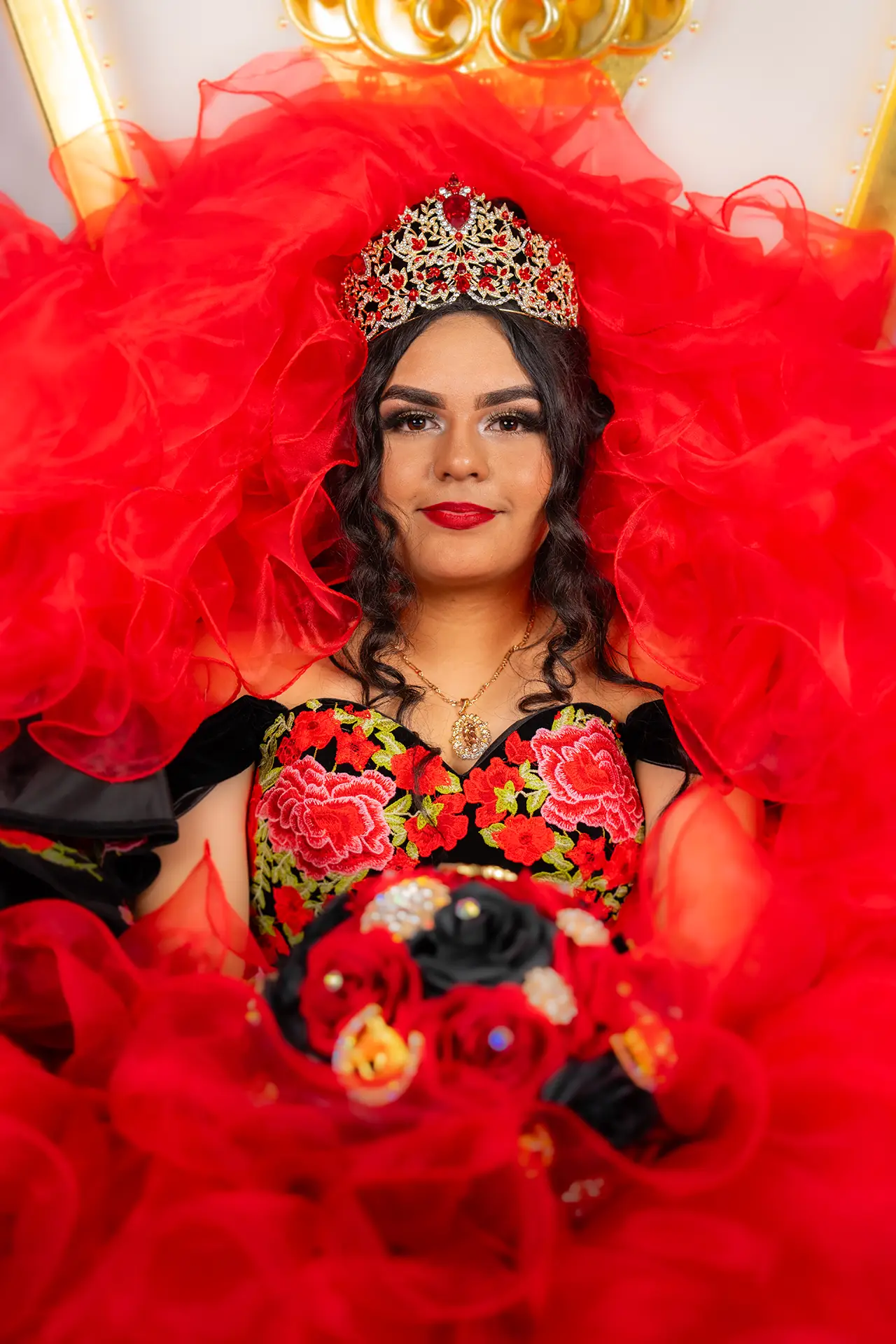 Artistic quinceañera portrait with red dress in Pasco